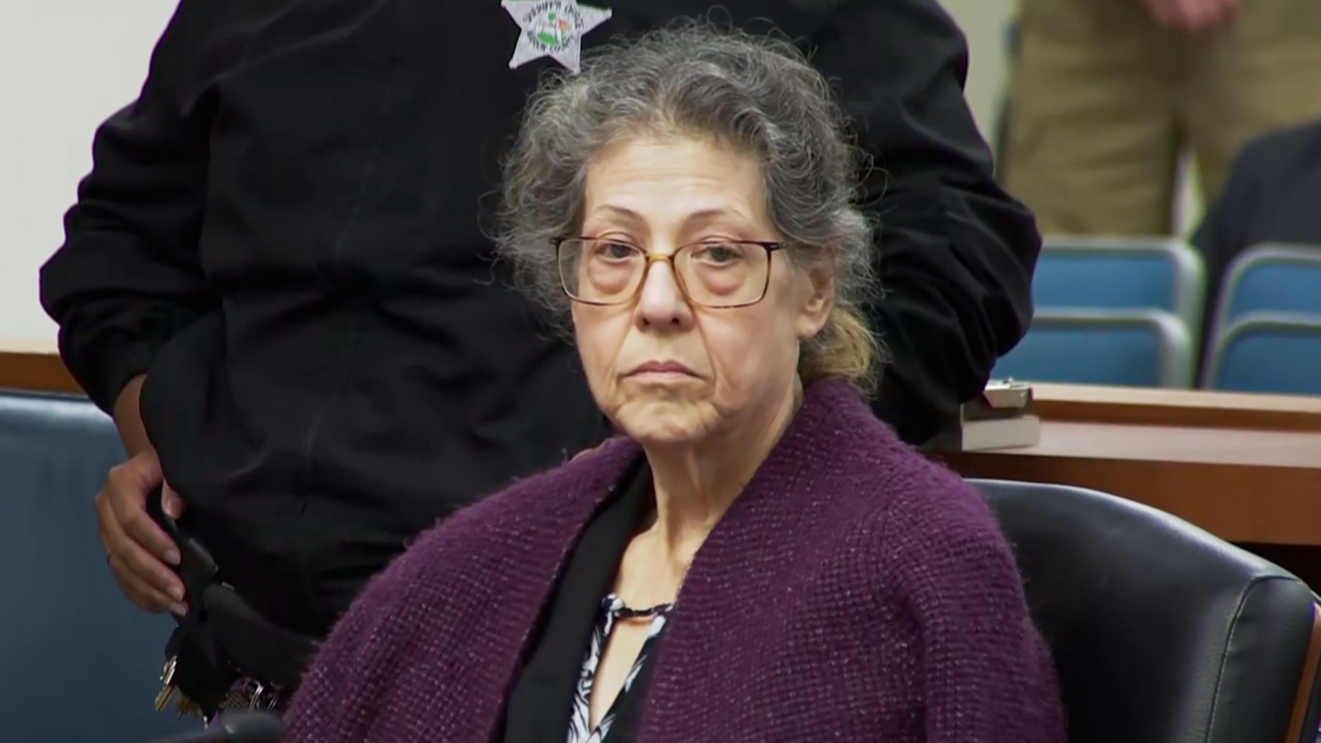 woman sitting in court
