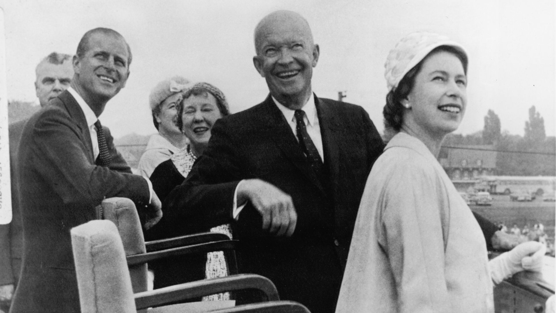 Black and white photo of President Eisenhower with Queen Elizabeth and Prince Philip