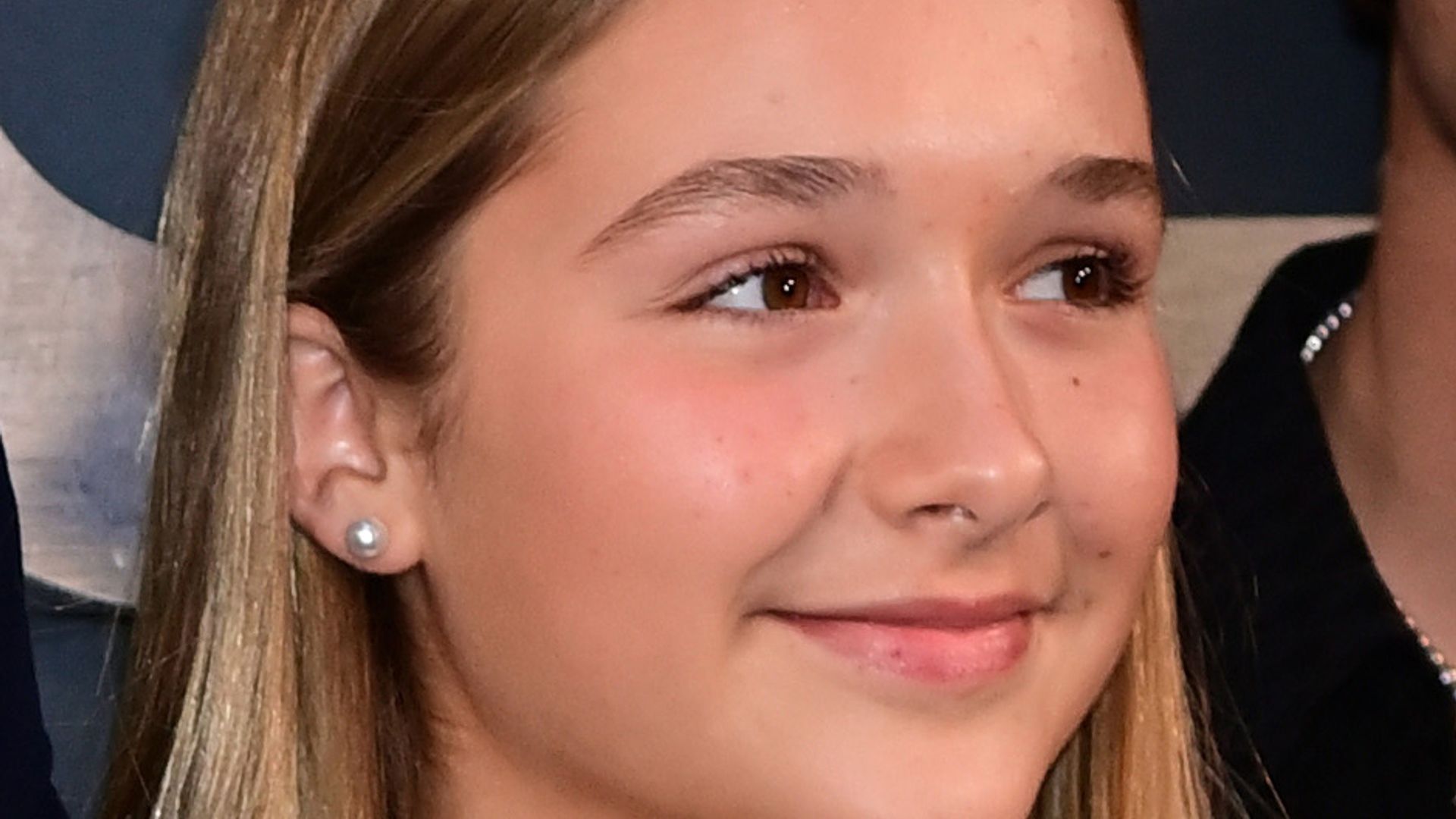 Harper Beckham long hair wearing pink dress