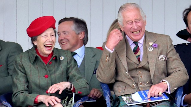 King Charles and Princess Anne laughing in tartan