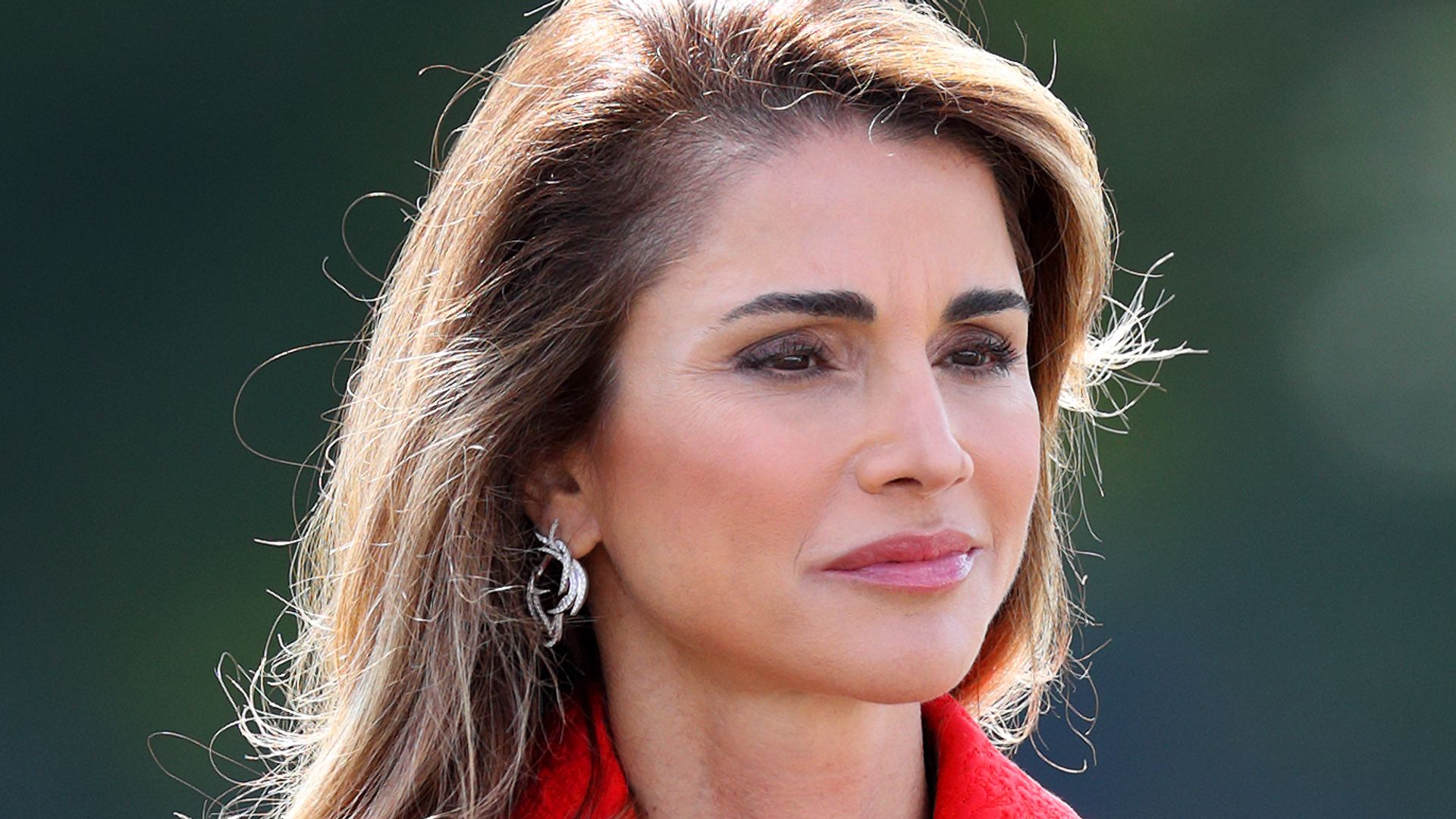 Queen Rania is a literal dancing queen emoji in cinched scarlet skirt