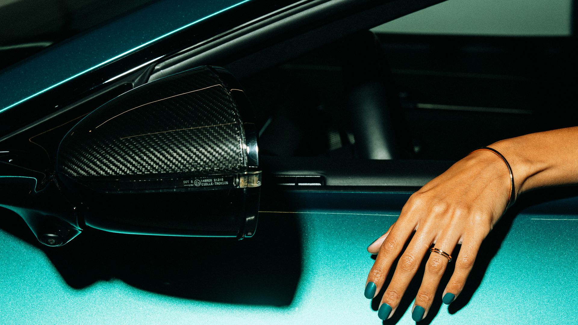 green car and green nails 
