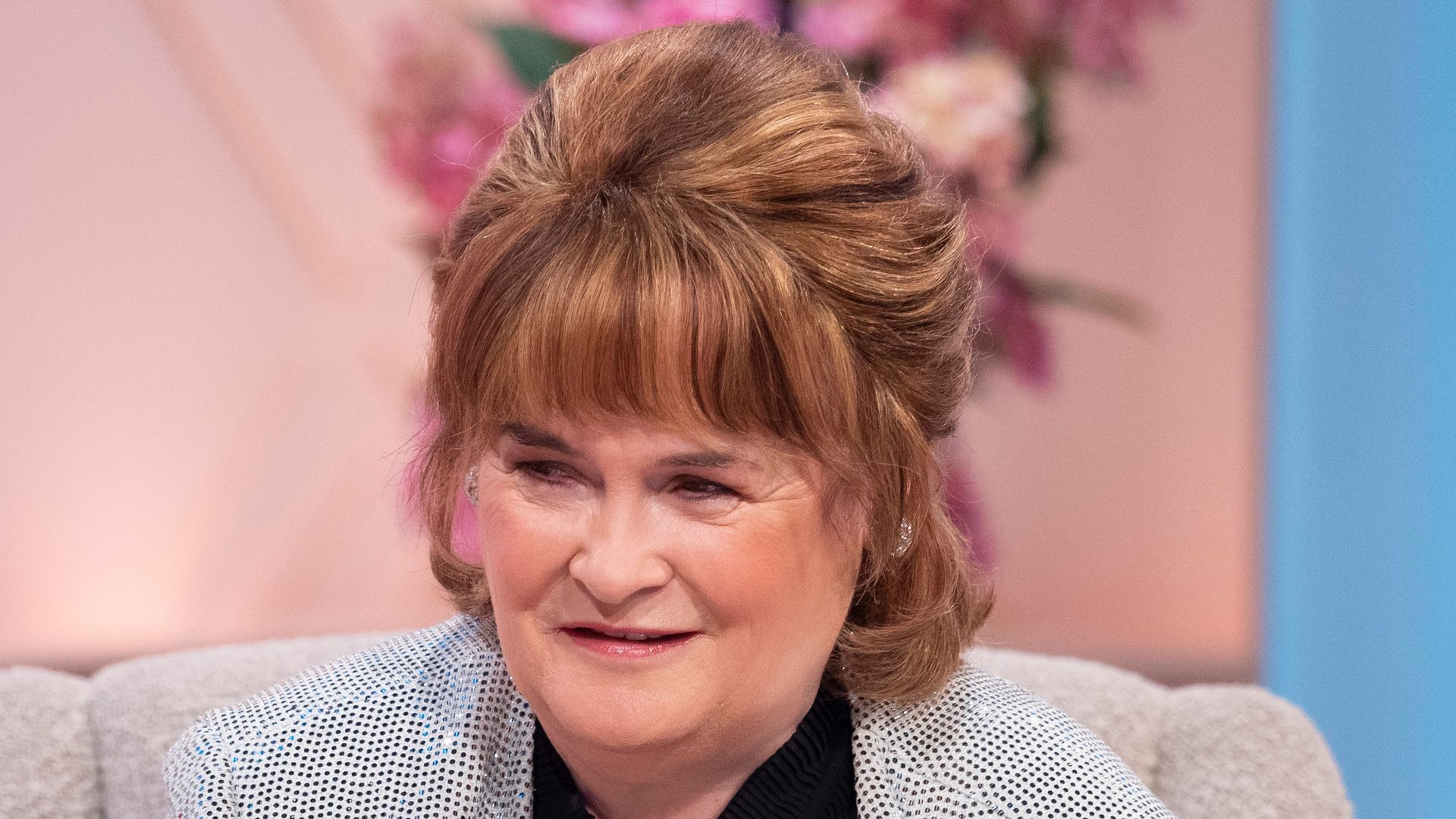 susan boyle in chair on tv show 