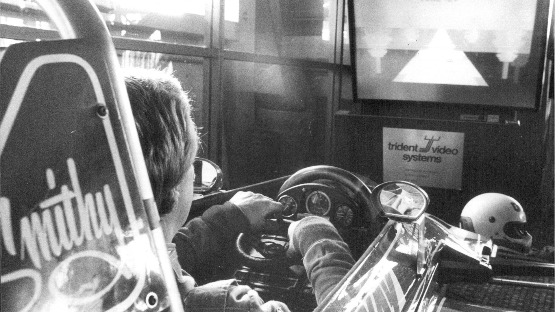 The new CBS Colecovision computer system was launched a press conference at Pier One Tavern today. Racing driver John Smith had the game fitted to his Ralt RT 4 racer.John Smith at the controls. August 30, 1983. (Photo by Alan Gilbert Purcell/Fairfax Media via Getty Images).