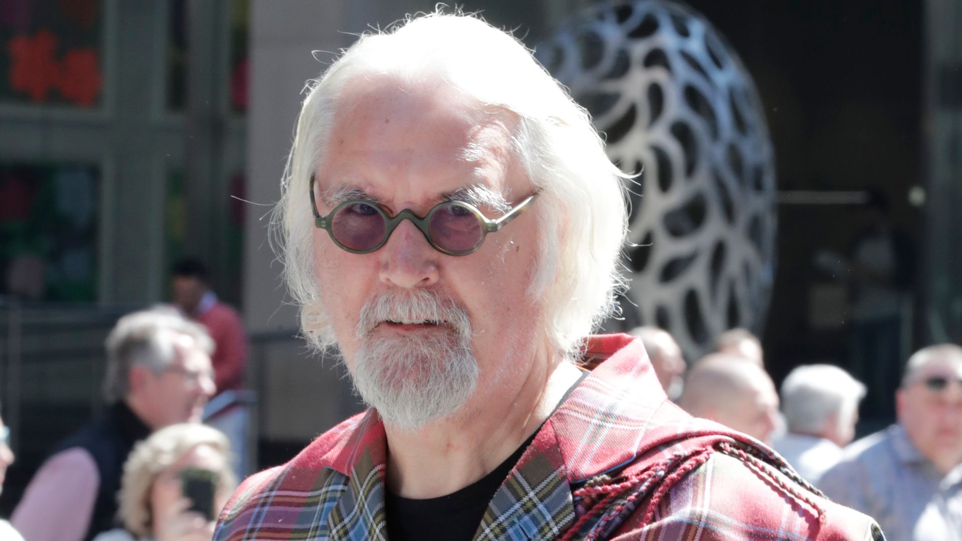 Billy Connolly in a tartan shirt