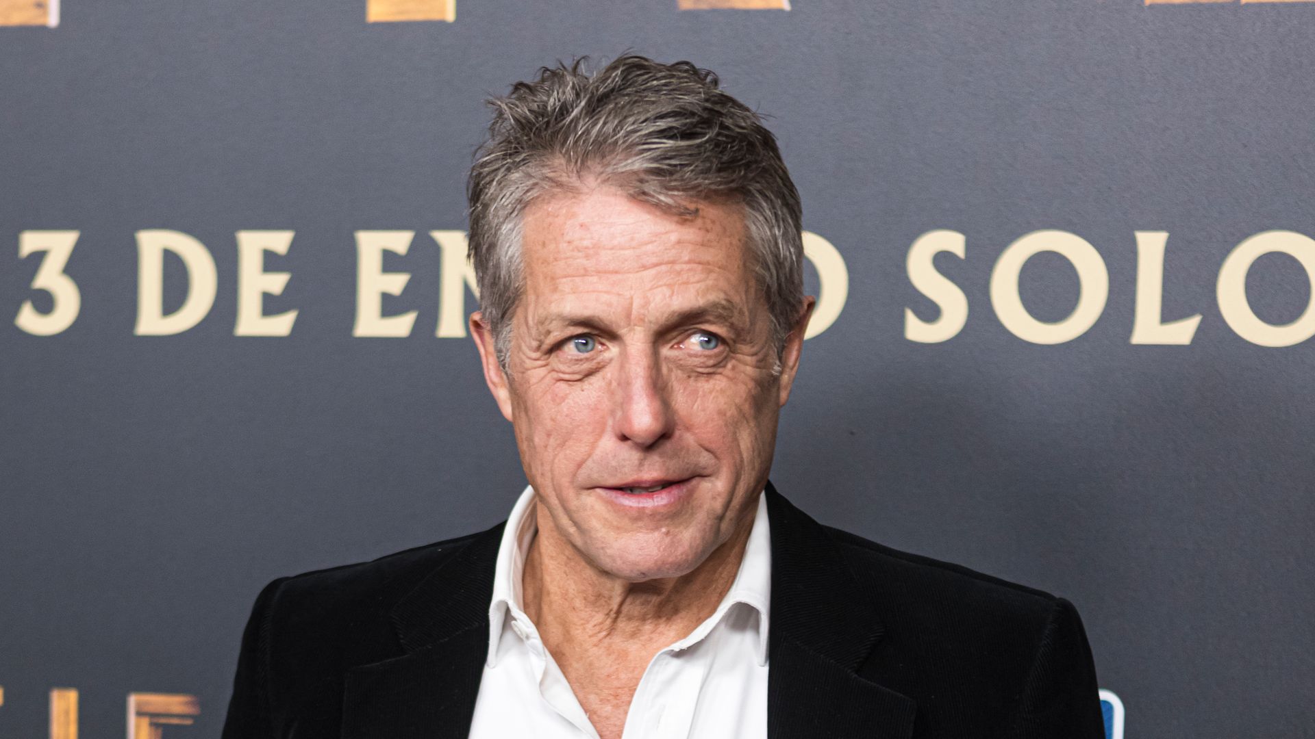 Hugh Grant has spoken out on Prince Harry's settlement