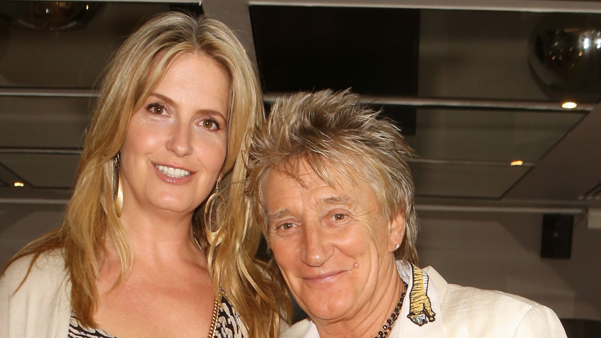 Penny Lancaster stood with Rod Stewart