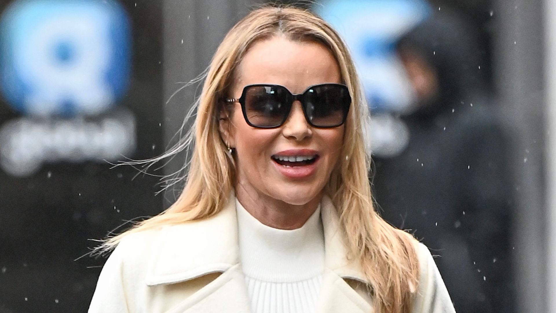 Amanda Holden in an all-white outfit