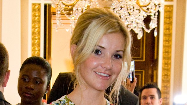 Helen Skelton inside Buckingham Palace weating a white floral dress