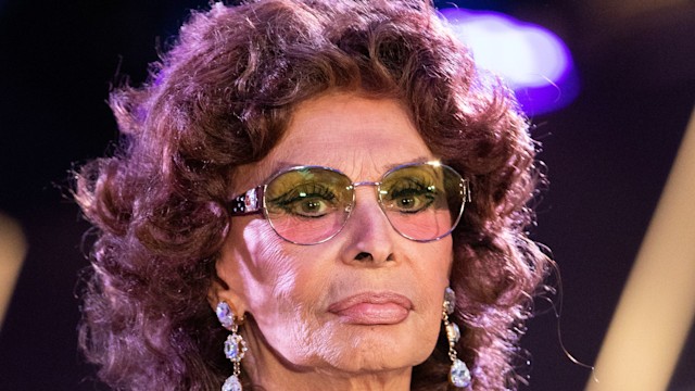 Sophia Loren in sparkly dress and tinted glasses