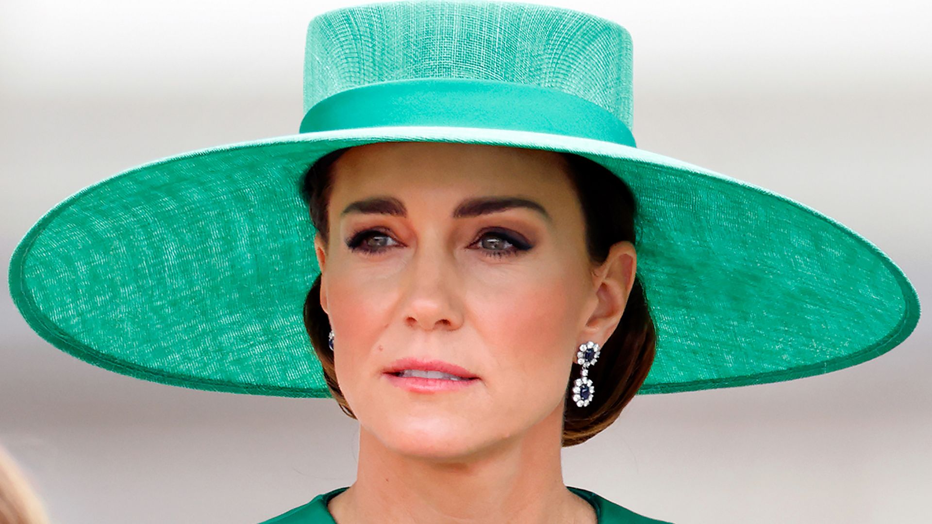 Kate Middleton wearing wide brimmed green hat