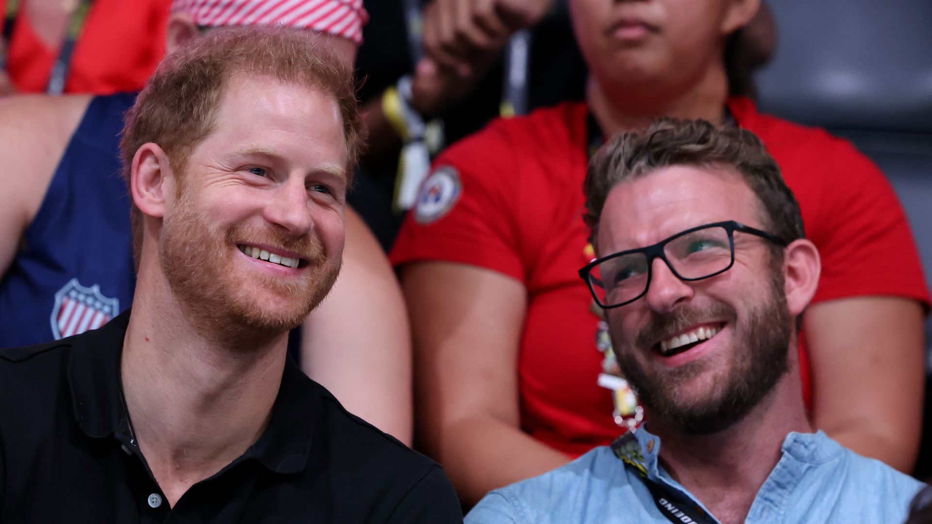 Prince Harry and JJ Chalmers laughing 