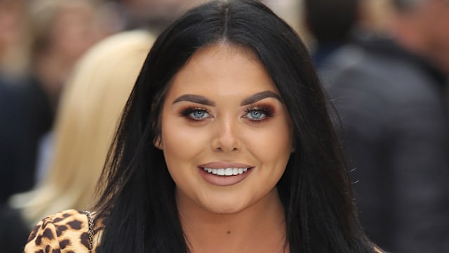 scarlett moffatt poses for camera 