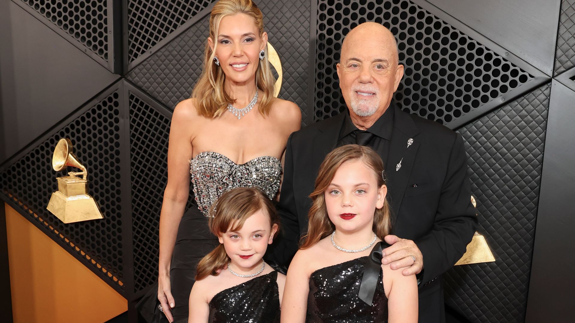 Billy Joel shares glimpse into private home life with rare photos of lookalike daughter Della