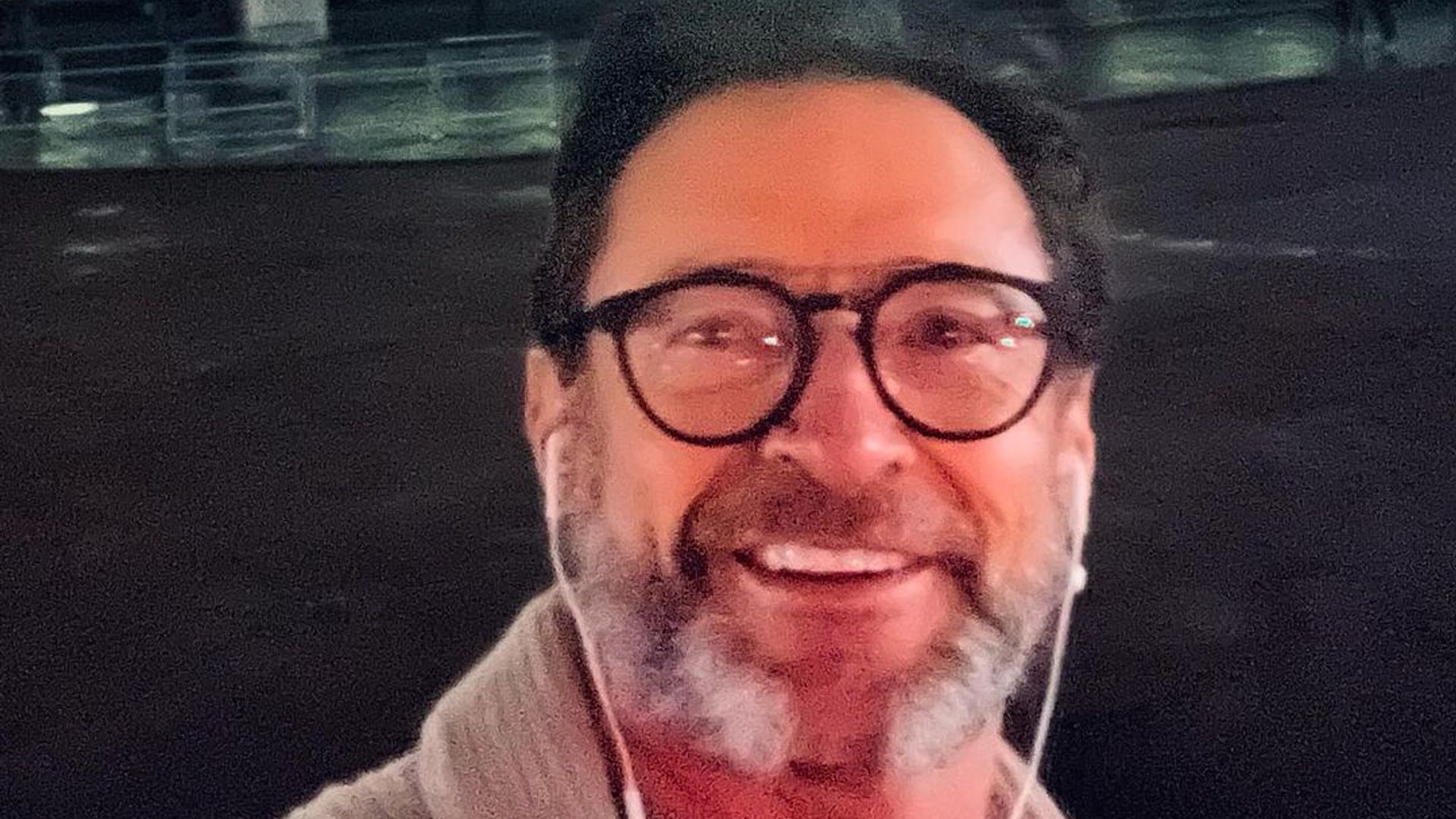 Hugh Jackman showcases his new sideburns after arriving in London in a photo shared on Instagram