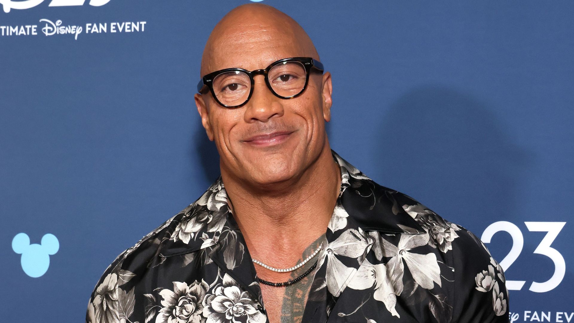 photo of dwayne johnson wearing glasses