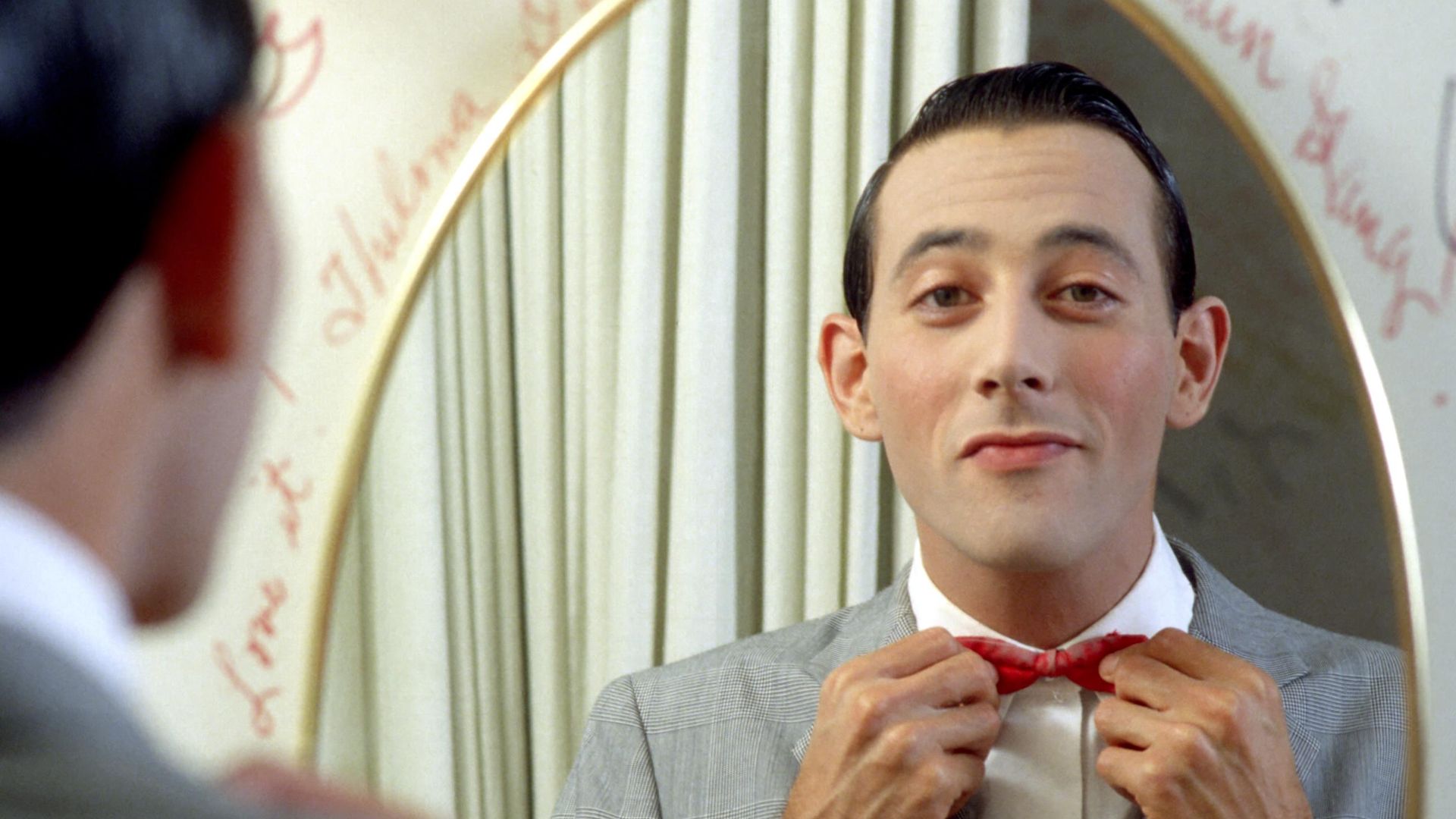 Paul Reubens poses for a portrait dressed as his character Pee-wee Herman in May 1980 in Los Angeles, California.
