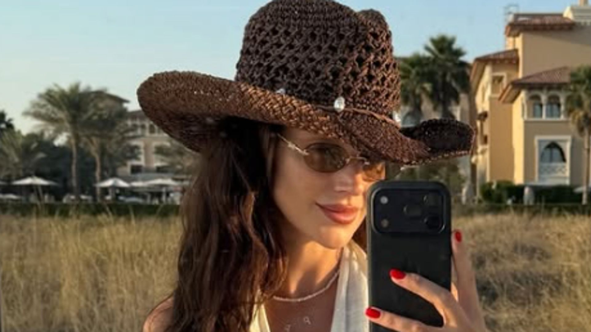 Michelle Keegan is the ultimate yummy mummy in plunging halterneck crop top