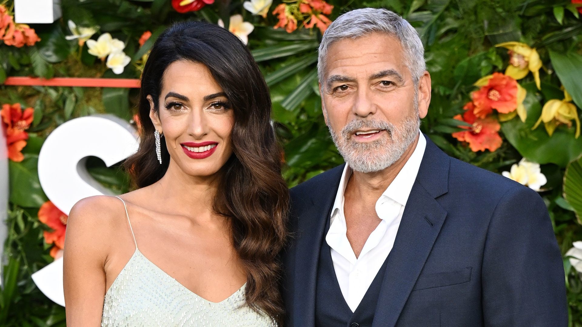 Amal Clooney and George Clooney attend the "Ticket To Paradise" World Film Premiere 