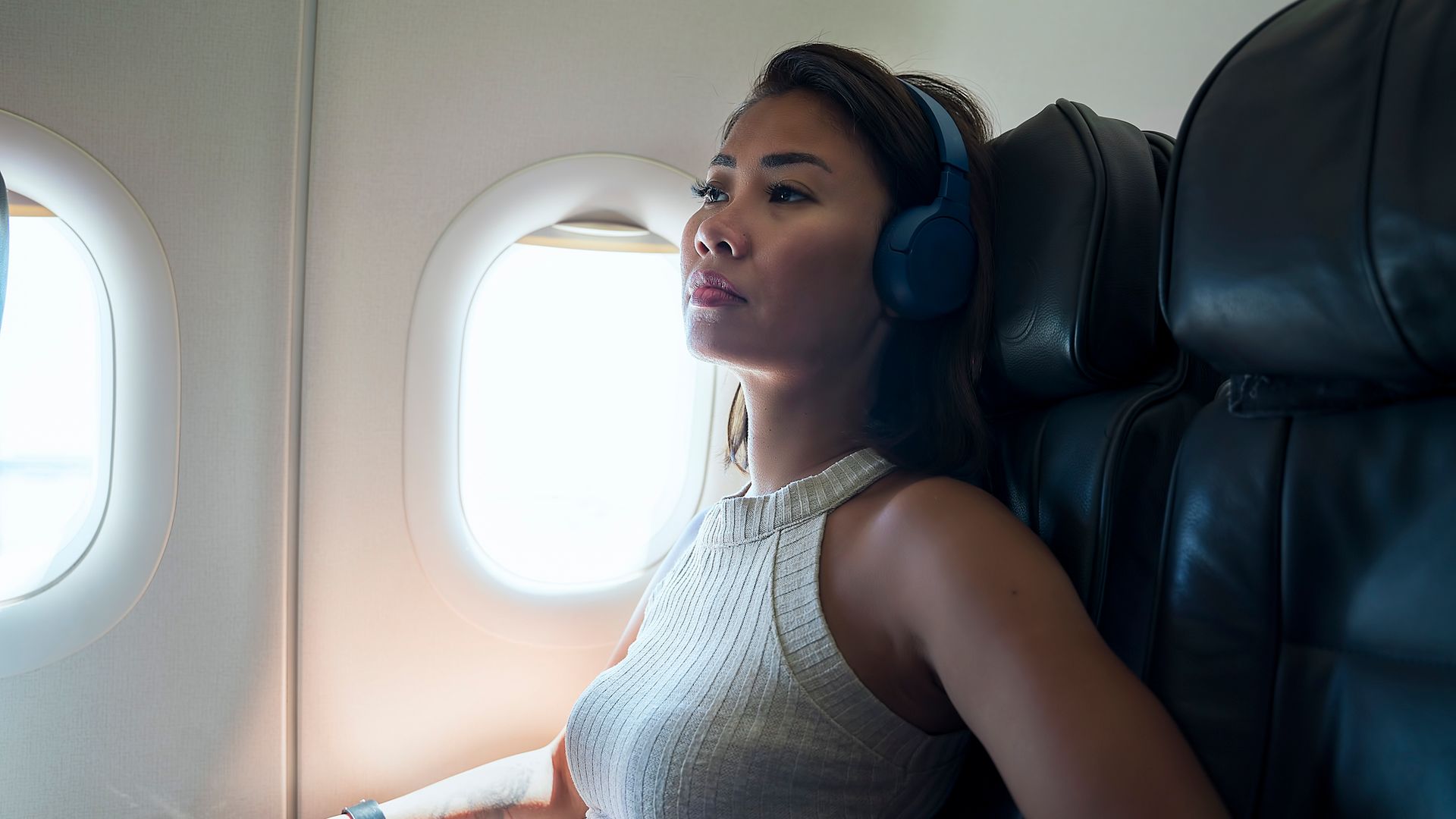 The frightened woman has a fear of flying airplane. A passenger traveling on the affected aircraft 