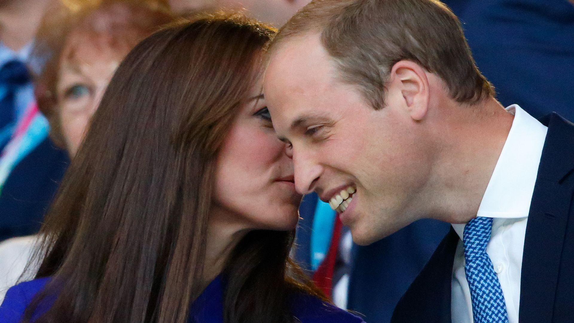 Princess Kate whispering to Prince William in 2015