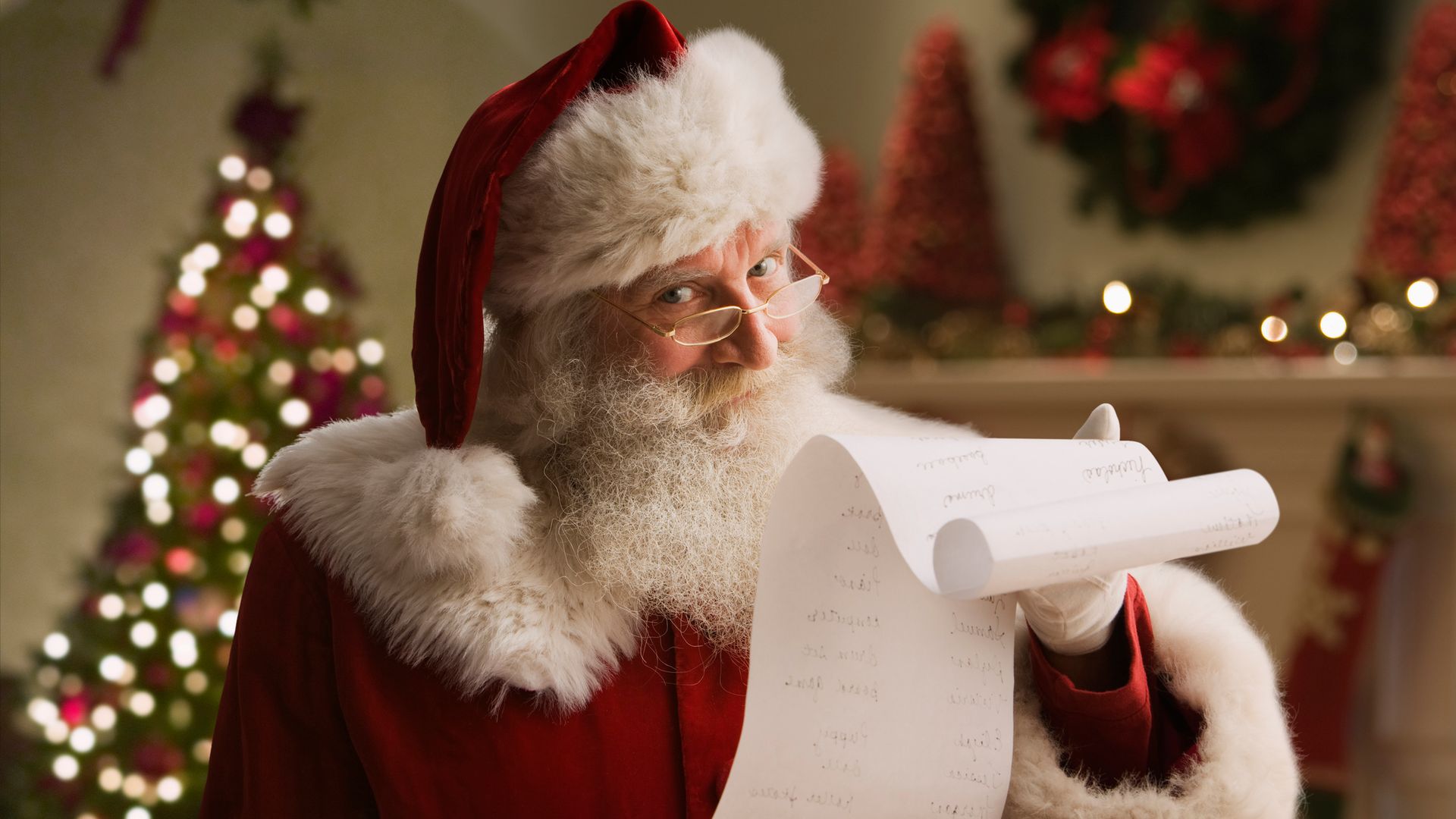Santa Claus with checklist, portrait, close-up