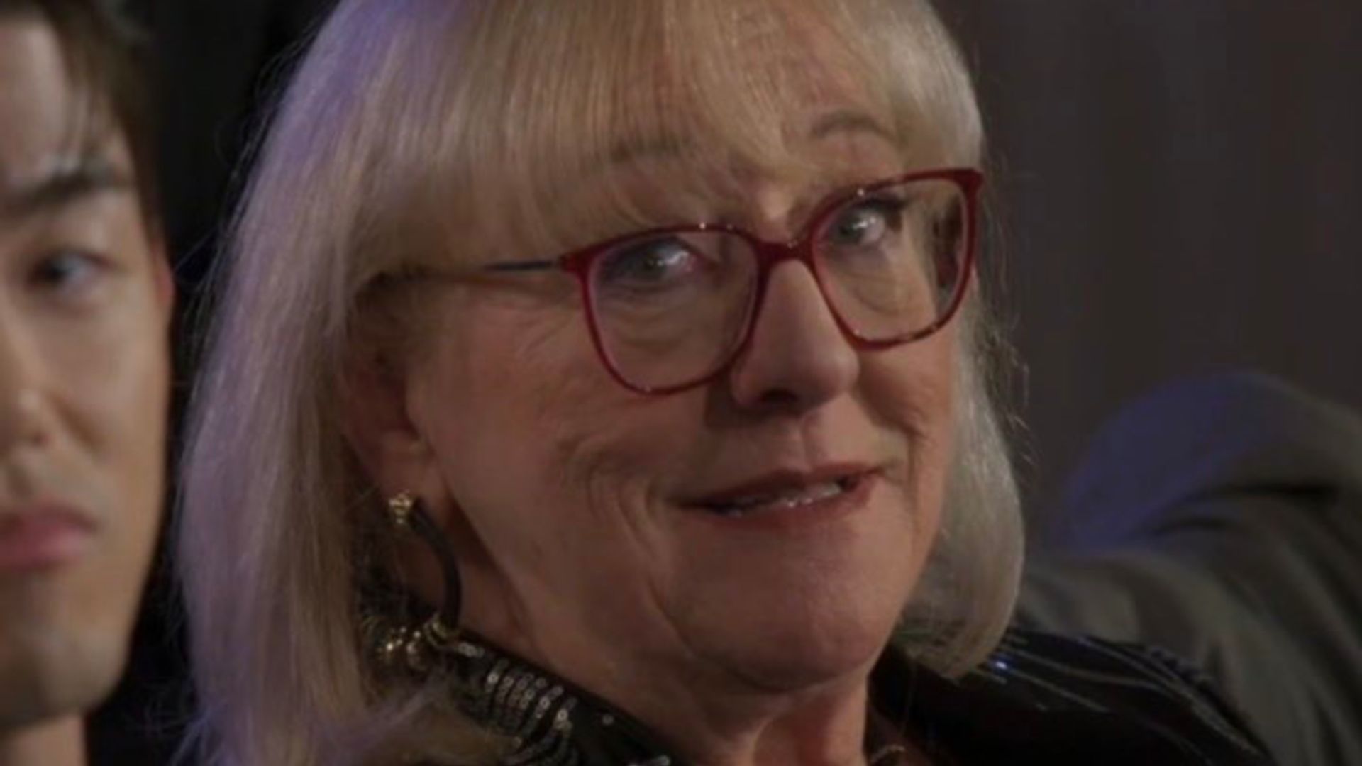 Travis Kelce's mom Donna struggles to hold back her emotions as two Traitors co-stars fight it out beside her