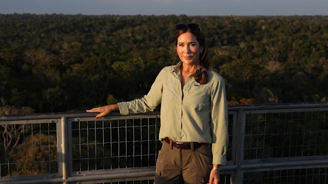 Queen Mary standing on observation tower at Museum of Amazon