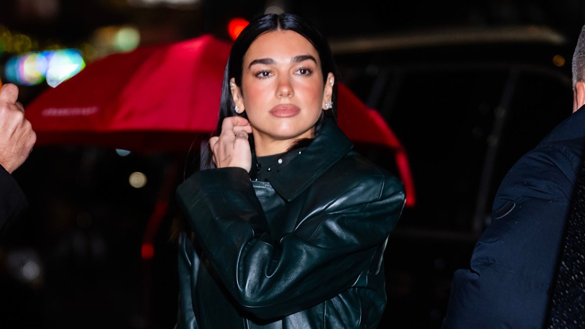 Dua Lipa dazzles in crystal-studded bodycon and leather coat