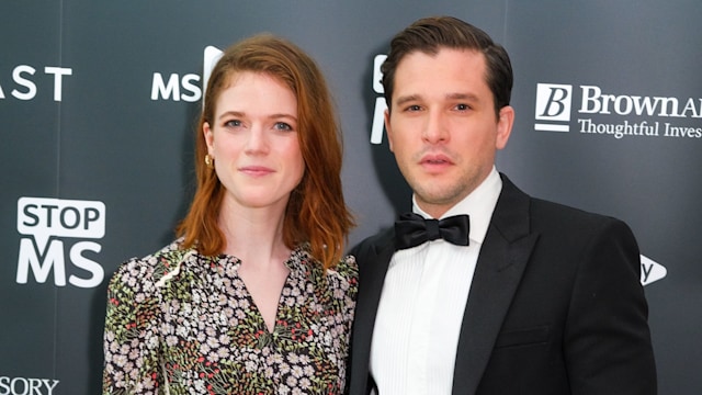 Rose Leslie in a floral dress and Kir Harington in a black tuxedo