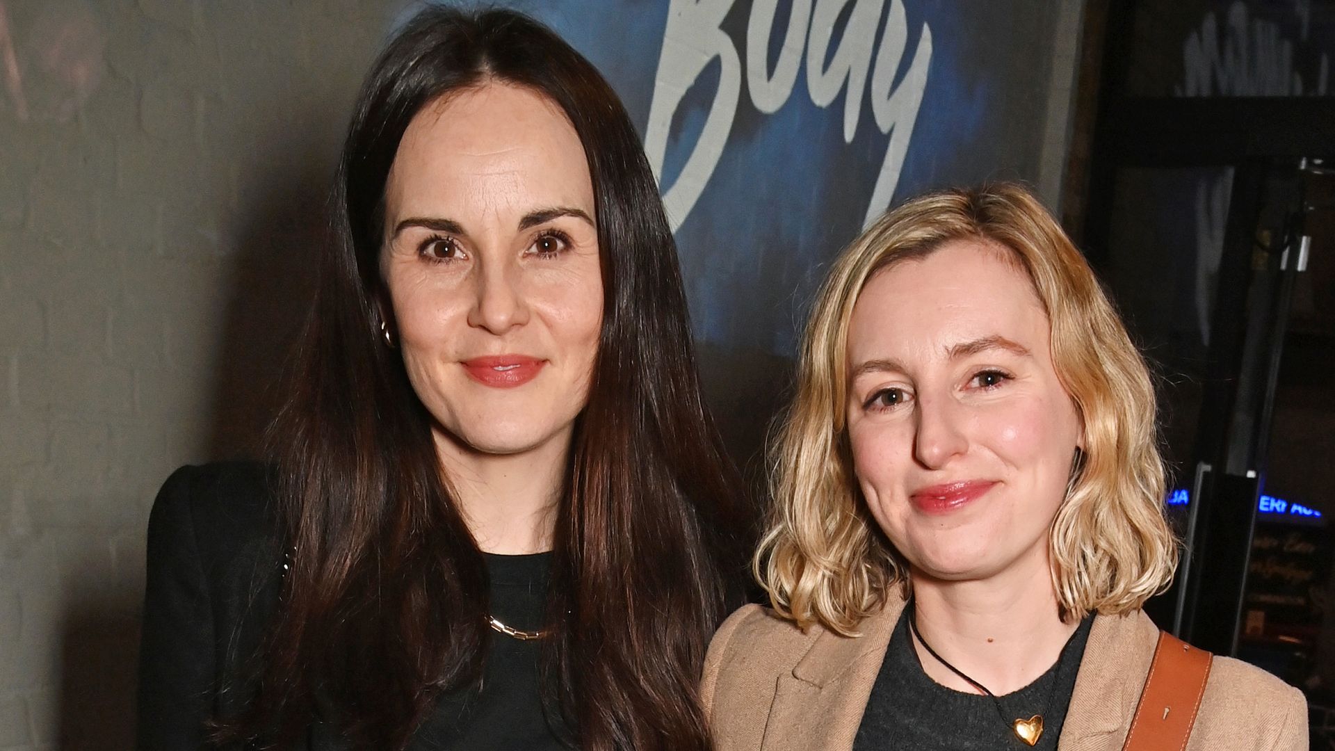 Downton Abbey's Michelle Dockery reunites with on-screen sister Laura Carmichael at star-studded event