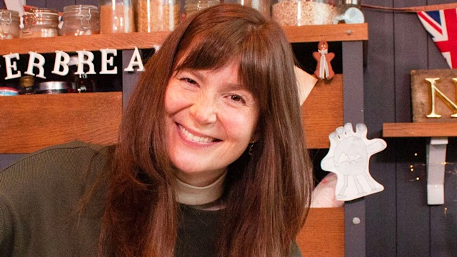 Natasha Raskin Sharp mixing food in the kitchen