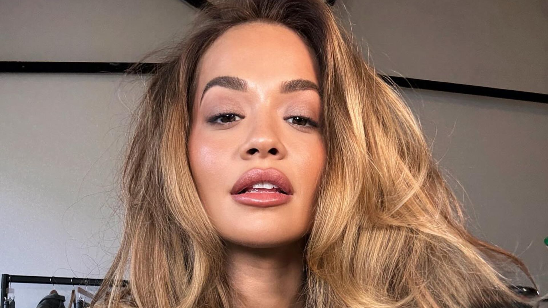 Rita Ora matched her tiny green bikini to her earrings and it's so 'Brat Girl Summer'