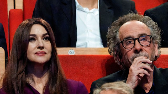 Tim Burton and Monica Bellucci  attend the Lumiere Award ceremony during the 14th Film Festival Lumiere on October 21, 2022 in Lyon, France