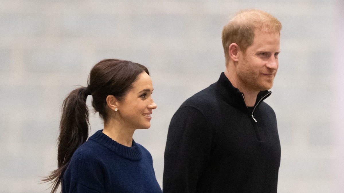 Prince Harry and Meghan Markle play musical instruments during Invictus Games day three