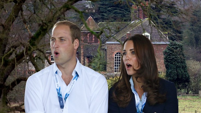 Prince William and Princess Kate looking shocked in front of a red brick house