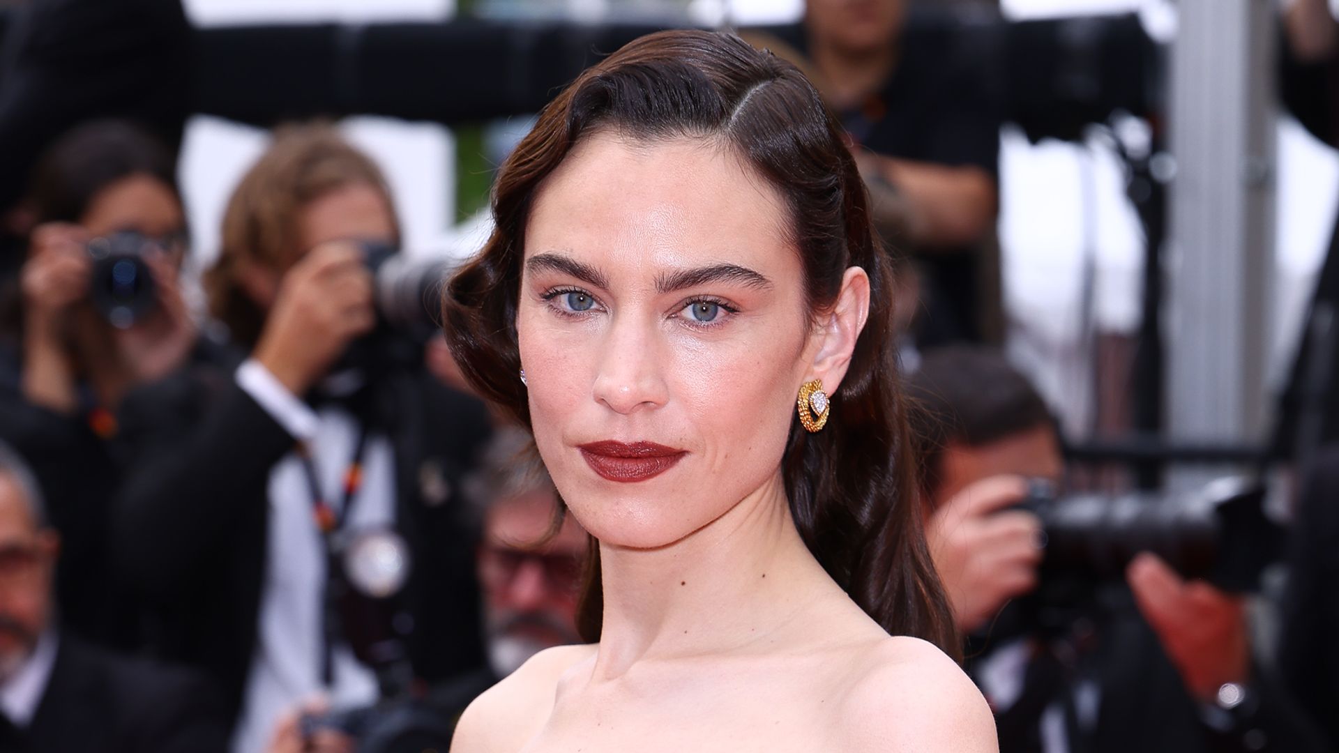 Alexa Chung attends the "Nouvelle Vague" (New Wave) red carpet at the 78th annual Cannes Film Festival at Palais des Festivals on May 17, 2025 in Cannes, France