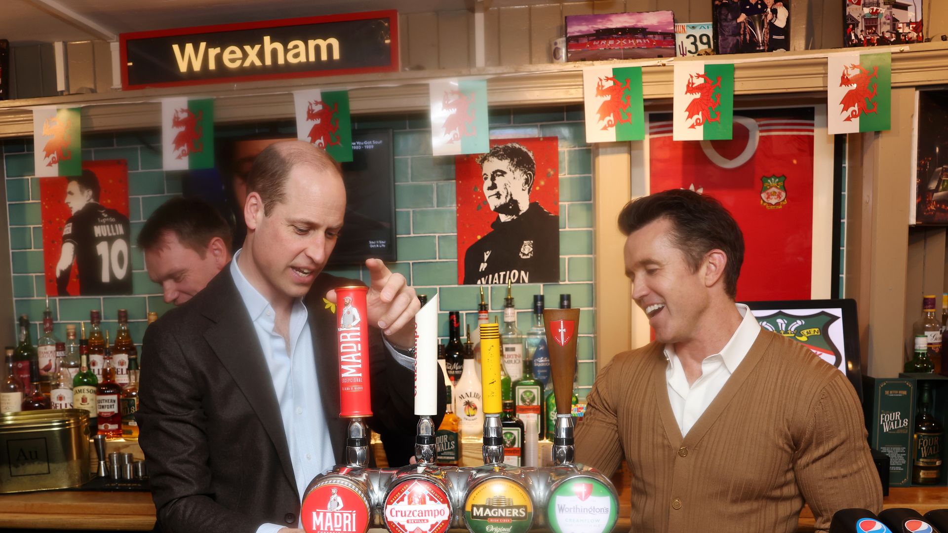 Prince William pulls pint in The Turf Pub
