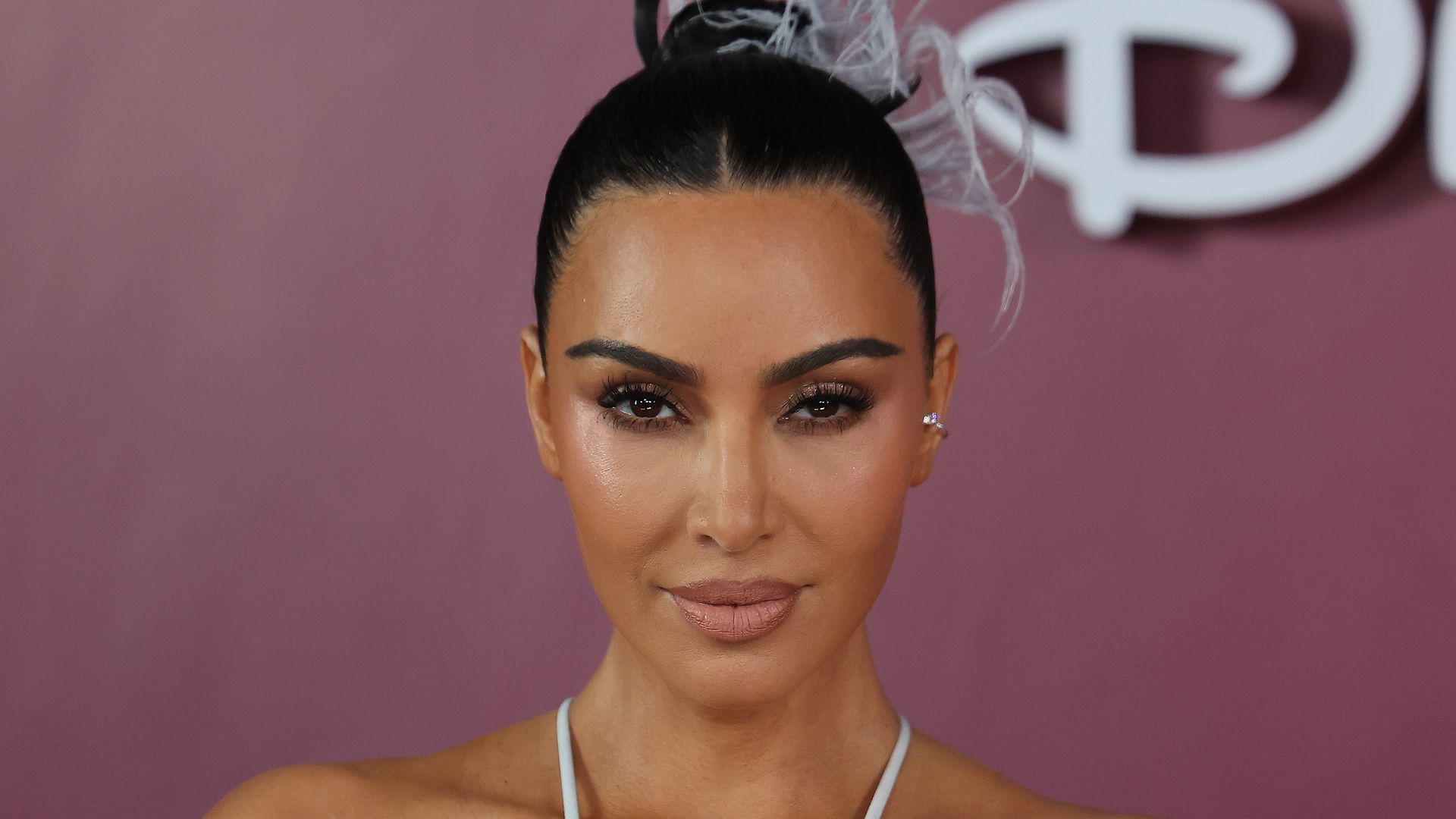 Kim Kardashian clings onto summer in itsy bitsy leopard print bikini