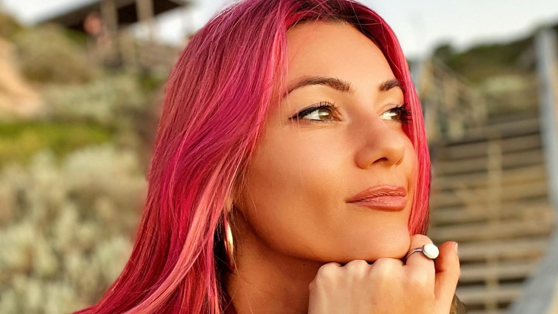 Dianne Buswell on a beach at sunset