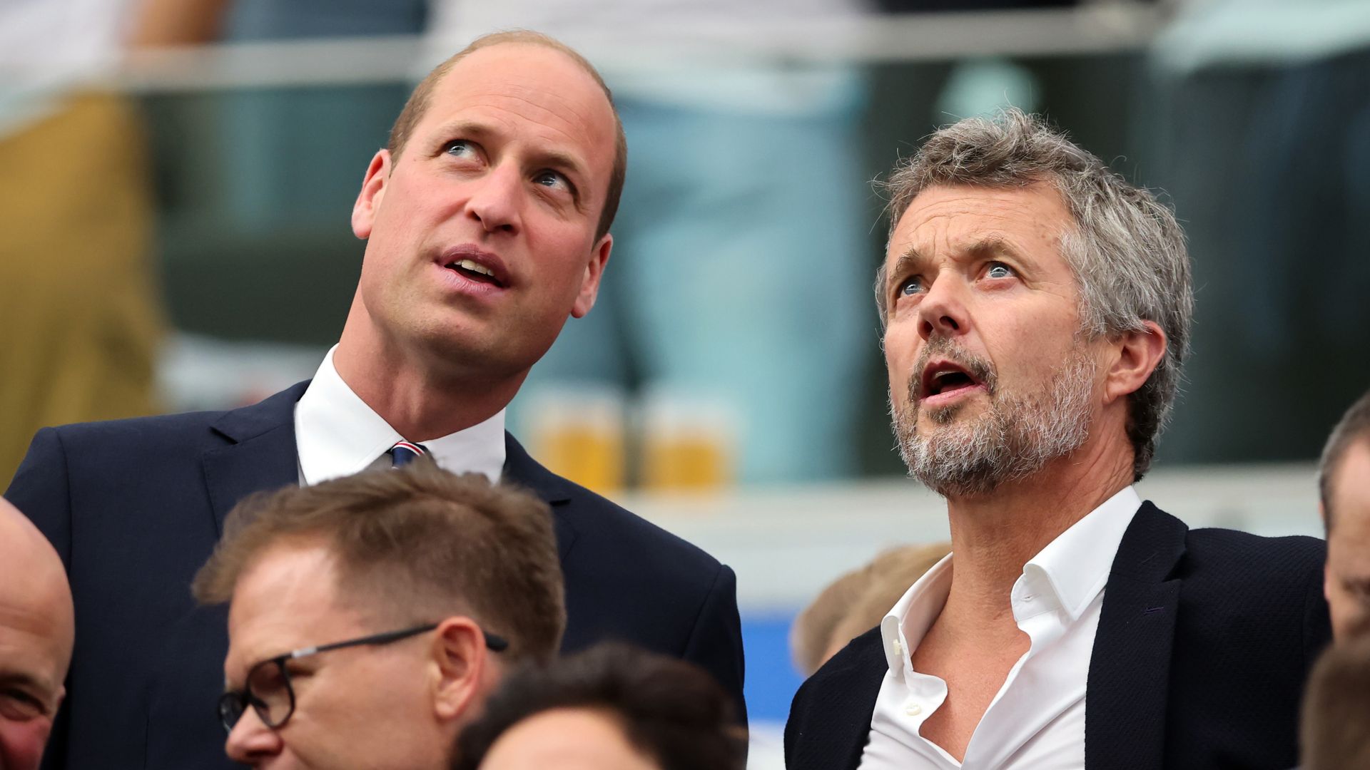 Prince William and King Frederik at a football match