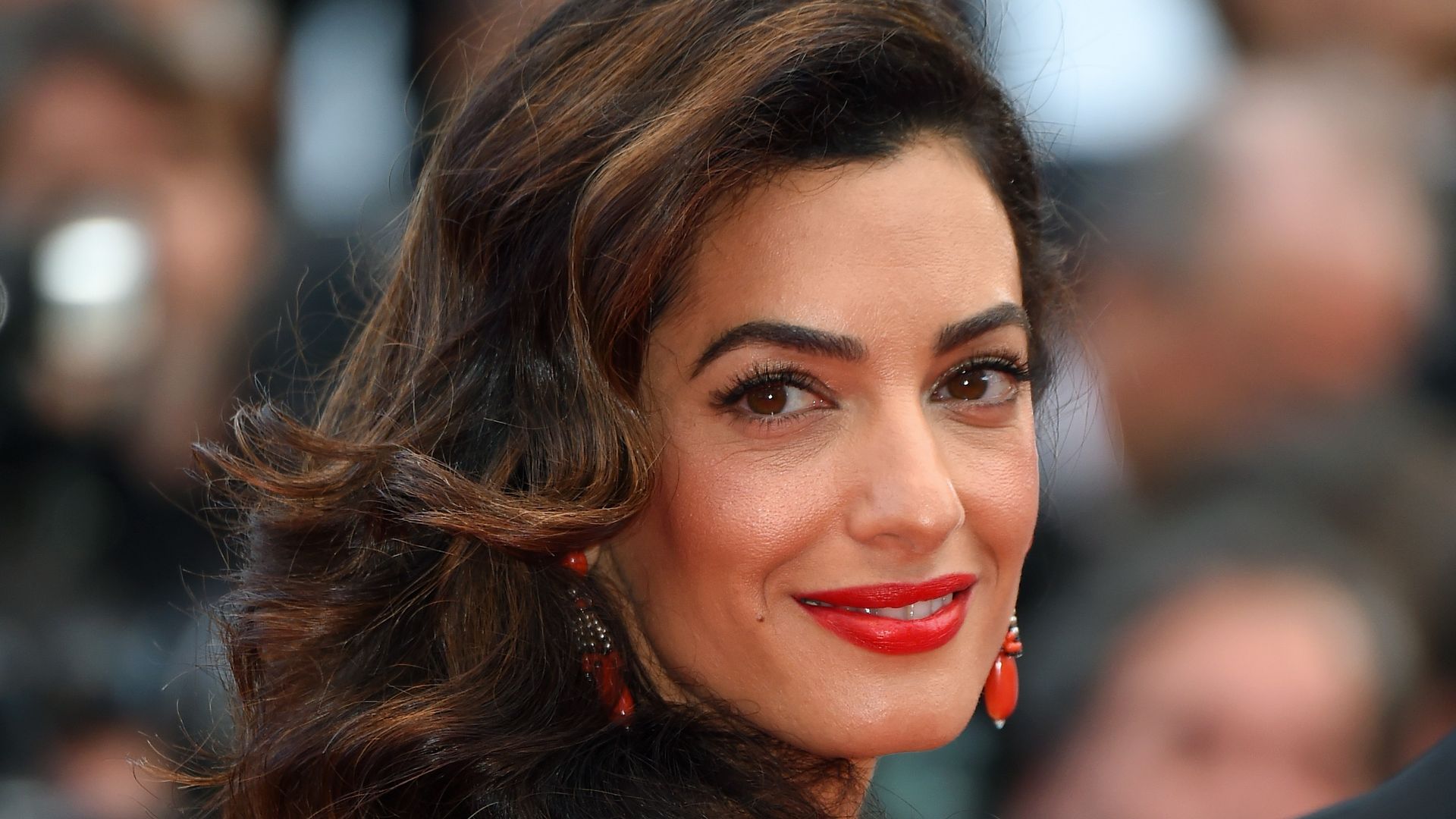 Amal Clooney dazzles in two of summer 2023's biggest fashion trends