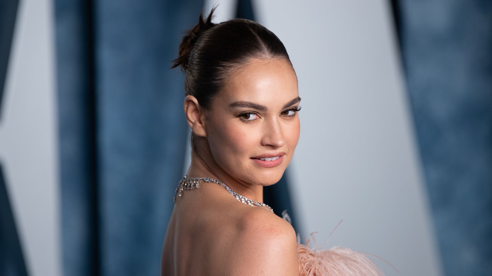 Lily James attends the 2023 Vanity Fair Oscar Party 