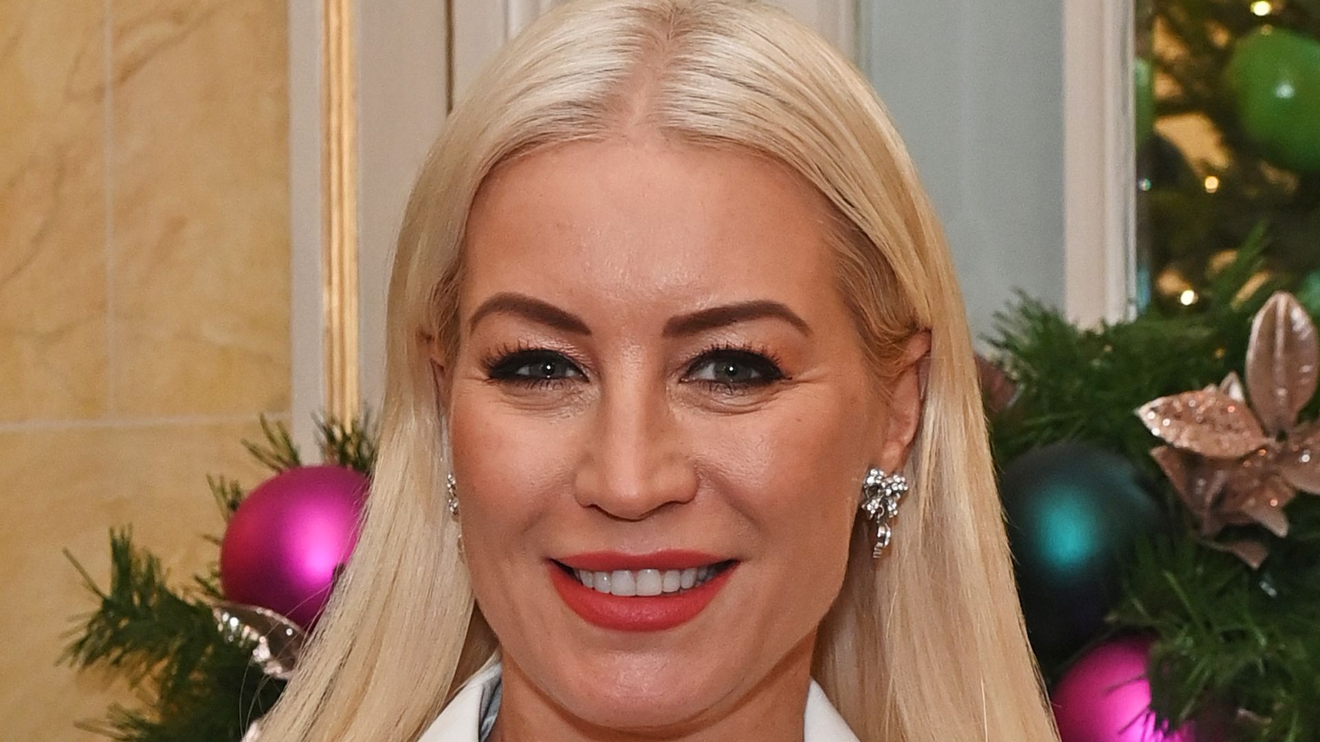 Denise van Outen shimmers in sassy disco trousers – and the colour!