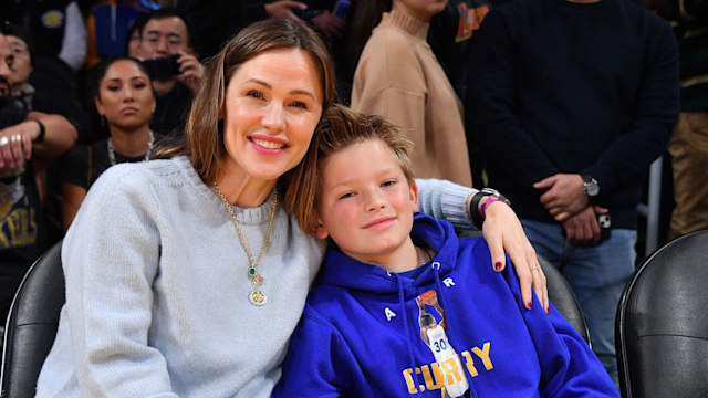 Jennifer Garner and her son Samuel Garner Affleck attend a basketball game between the Los Angeles Lakers and the Golden State Warriors at Crypto.com Arena on March 05, 2023 in Los Angeles, California