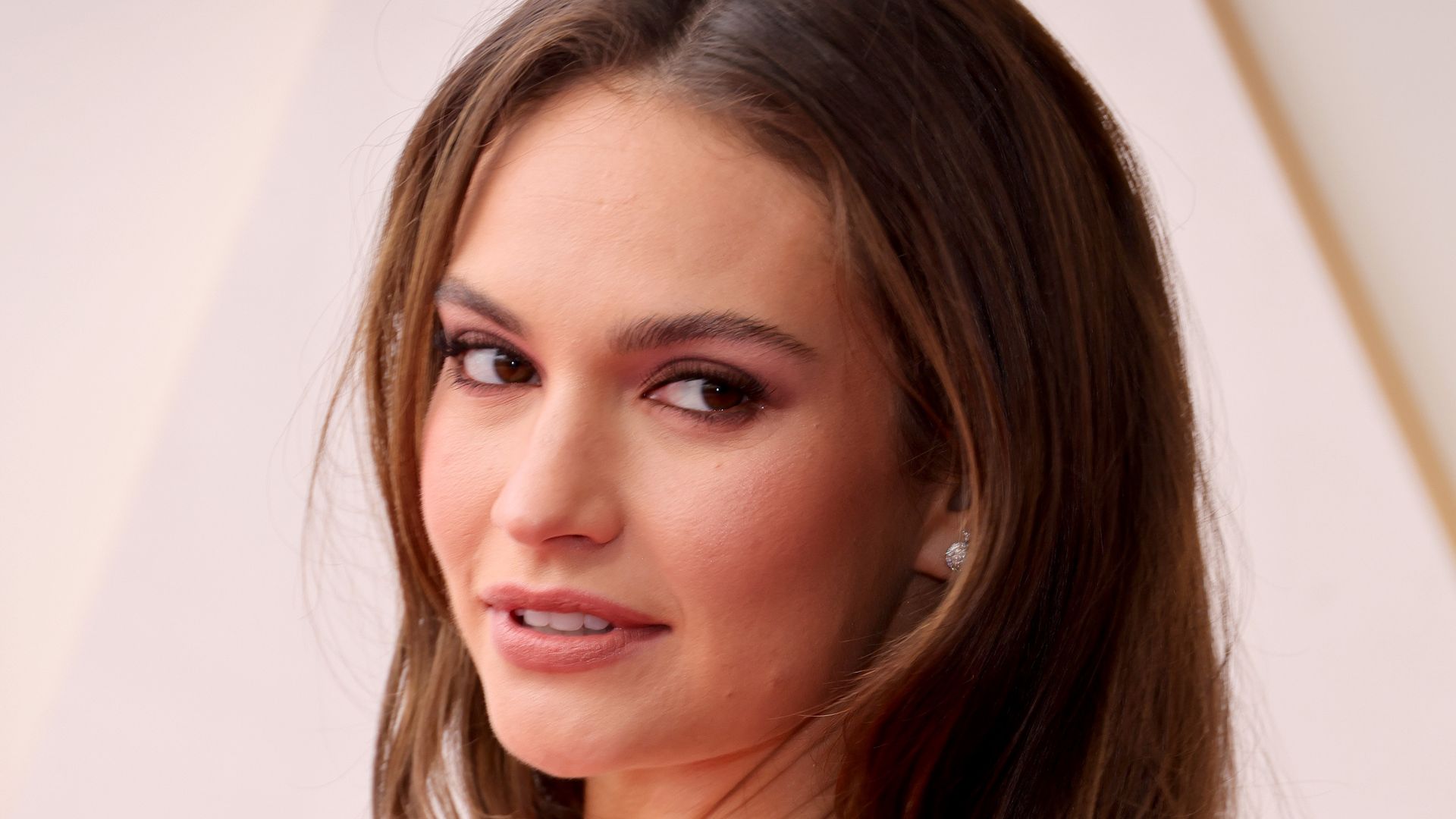 Lily James attends the 94th Annual Academy Awards at Hollywood and Highland 