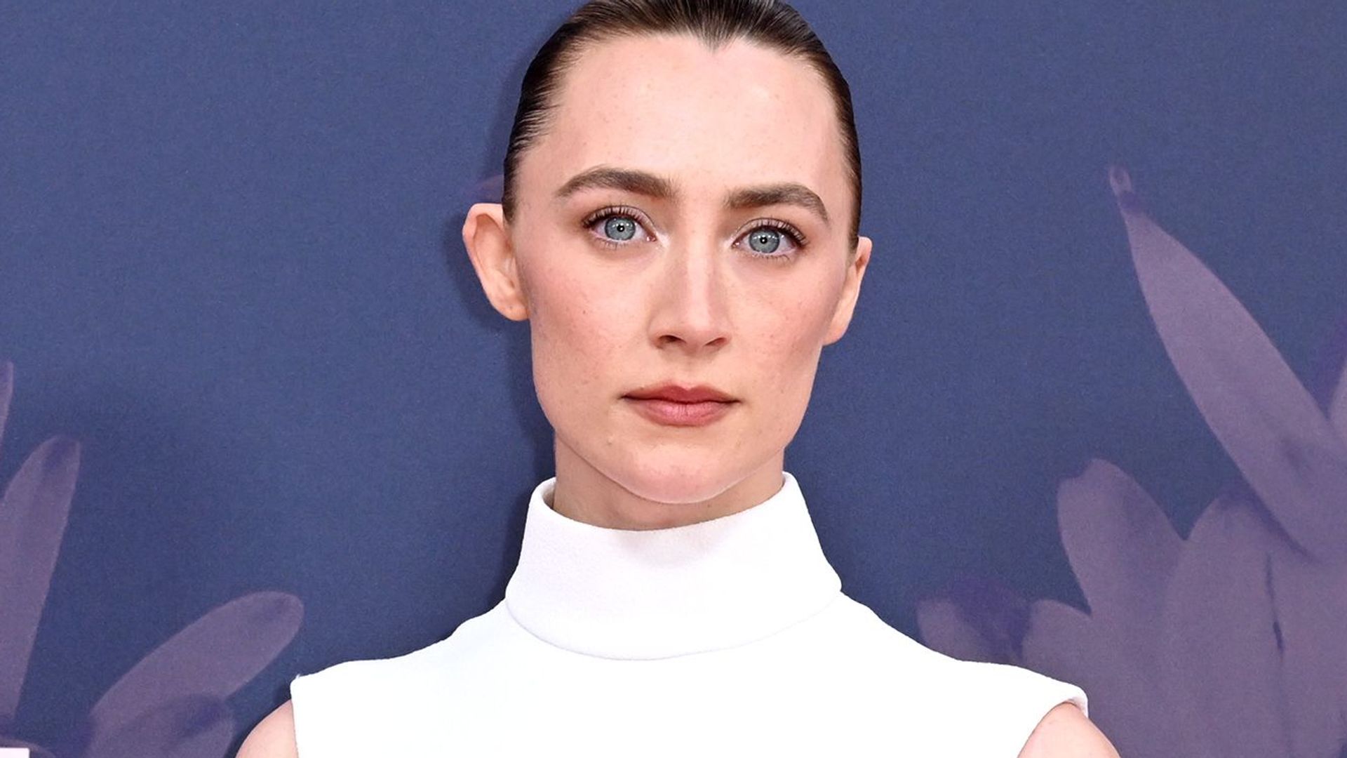 Saoirse Ronan in a white dress with her hair up