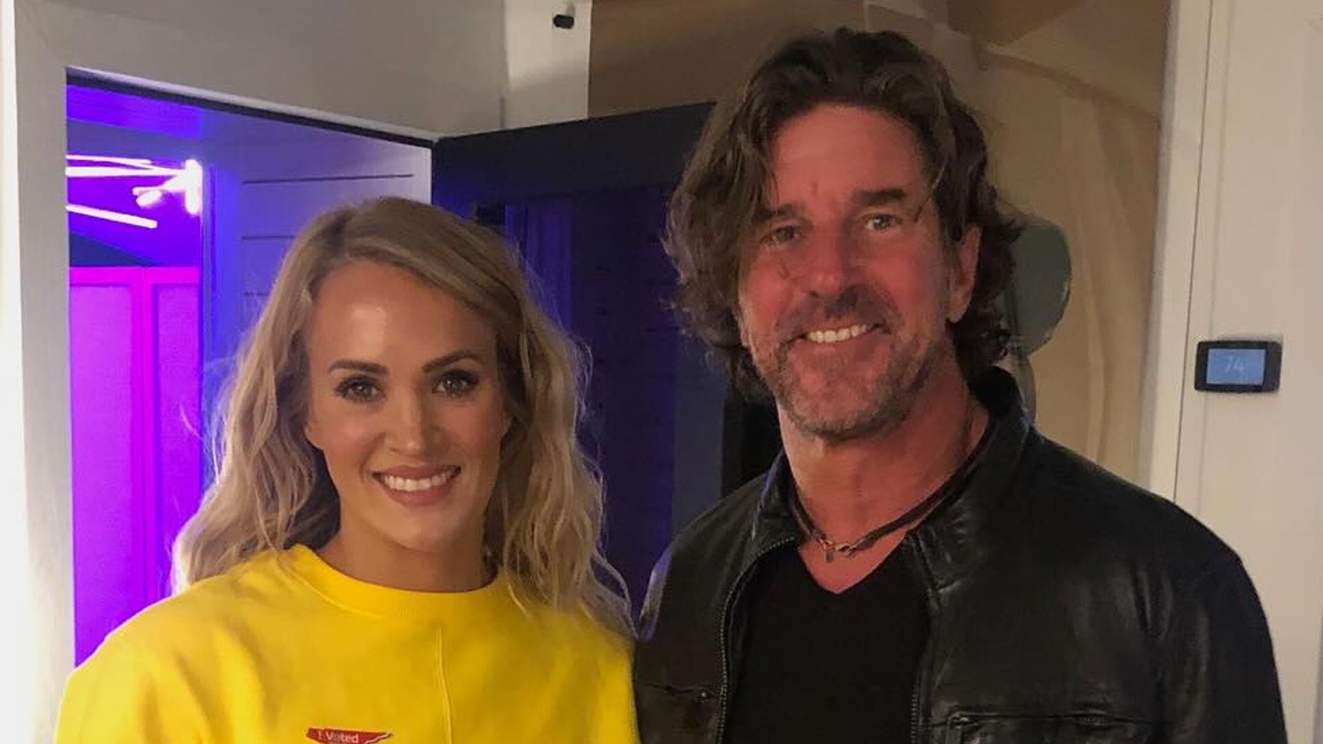 photo of carrie underwood and brett james in dressing room