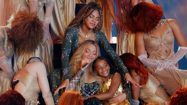 Rumi Carter on stage with Beyoncé and Blue Ivy 