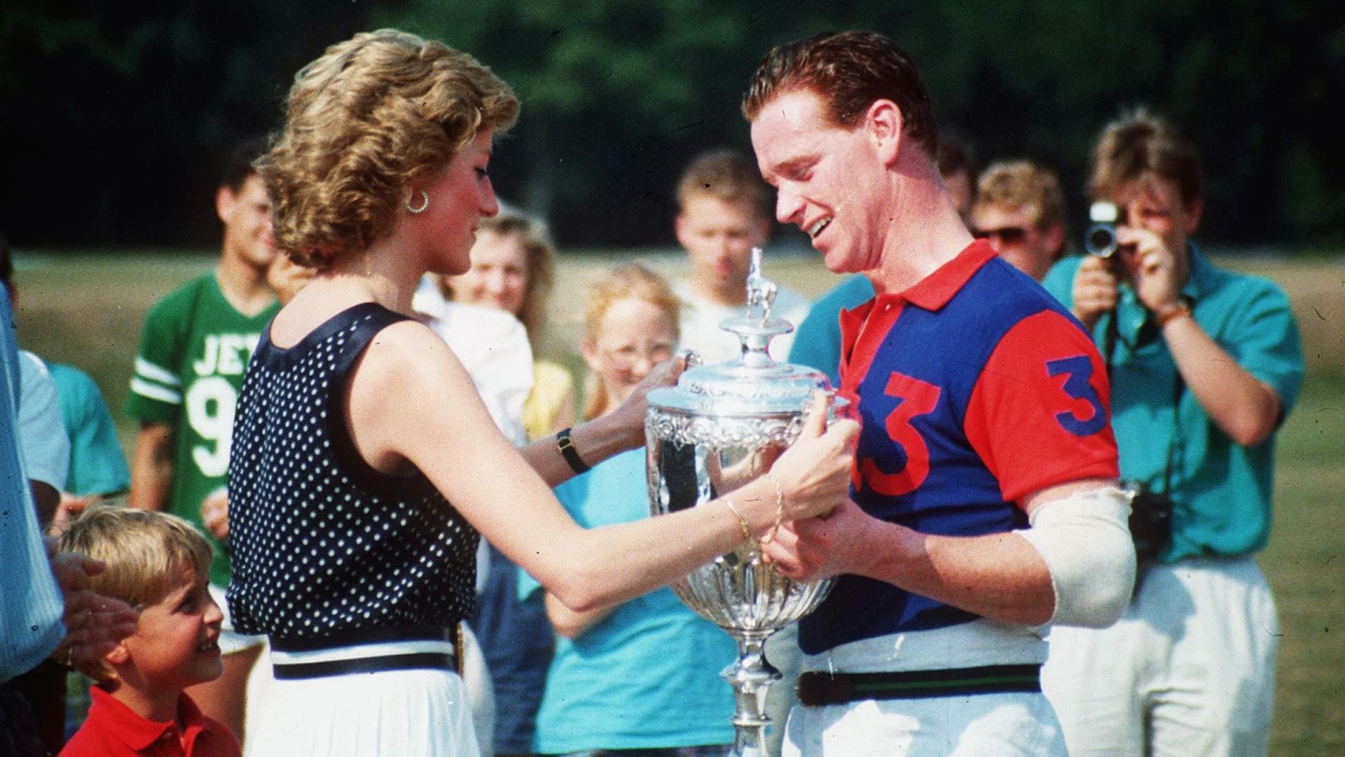Princess Diana handing a trophy to James Hewitt